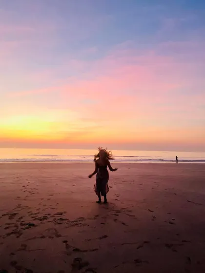 Dancing on the beach at sunset. This is a reminder to myself to embrace freedom, joy, and playfulness as an essential part of my spiritual practice.