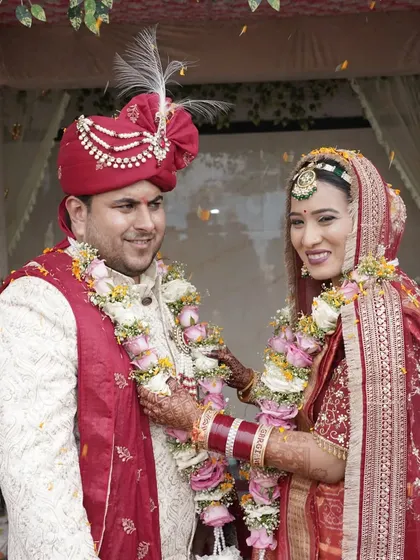 A joyful moment during Nikhil and Gargi's wedding. Their smiles reflect the happiness of finding a like-minded partner through a platform that understands the importance of a spiritual connection.