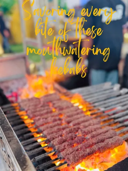 Mouthwatering Irani seekh kebabs cooking over open flames, a popular and flavorful choice for any event.