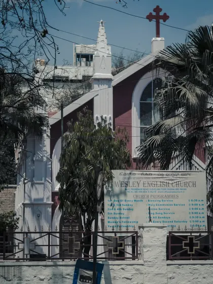 The Wesley English Church in Bangalore. A straightforward architectural shot that captures the building's unique design and presence.
