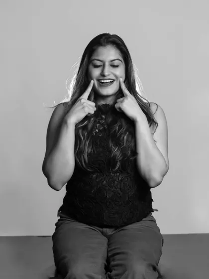 A playful and fun black and white portrait. Studio sessions can be relaxed, allowing us to capture different sides of your personality.