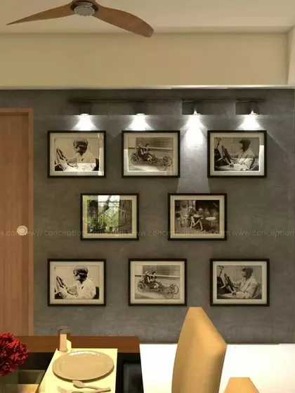 A close-up of the gallery wall in the Candeur Carlisle dining room, perfect for displaying family photos or art.