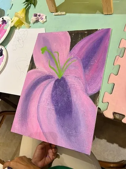 The beautiful final result of a floral painting session. Even beginners can create stunning artwork with our step-by-step guidance and support.