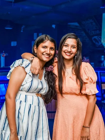 Best friends enjoying a night out. My pub is the perfect place to catch up, celebrate, or just hang out with your favorite people.