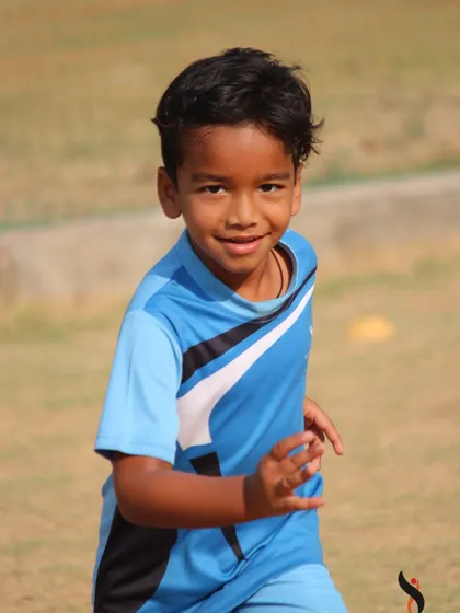 A happy moment during a challenging drill. Our summer camps are designed to be both demanding and incredibly fun.