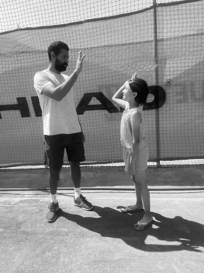 A high-five between a coach and one of our youngest players. We are launching soon to bring a new level of professional and youth tennis development to Bangalore.
