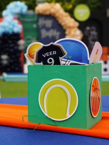 Themed centerpieces for the tables, continuing the multi-sport theme throughout the entire party space.