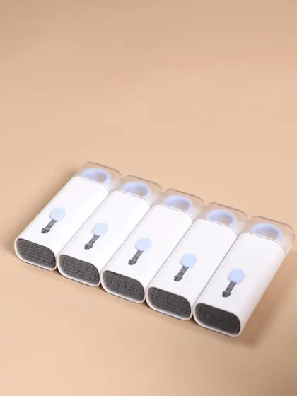 This compact, multi-functional gadget cleaner was a unique addition to the Green Soul kit. It's a modern and useful tech accessory that shows attention to detail.