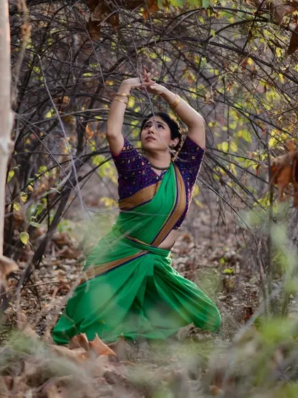 Seated in a forest grove, this pose evokes a sense of being one with nature. For me, Bharatanatyam is a way to connect with something ancient and elemental.