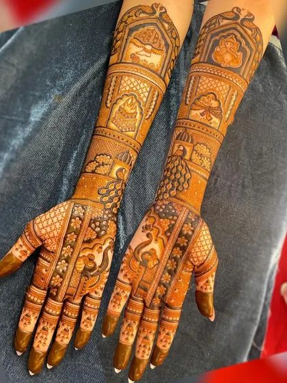 A classic design with palace architecture, peacocks, and intricate filler patterns, perfect for a traditional bride.