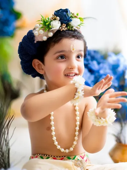 A candid shot of a dancing Krishna, full of movement and joy. I encourage children to play and be themselves to capture their true spirit.