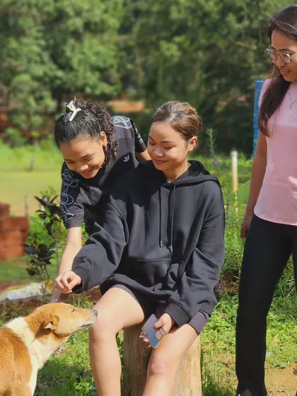 Making friends with a local dog at the Kodachadri resort. It's these small, heartwarming moments that make a trip special.
