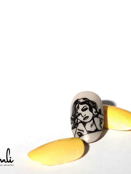 A simple yet effective stamping design of a woman's portrait.