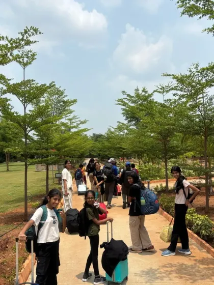 Young adventurers arriving at the campsite with their luggage, ready for three days of exploration. We handle all logistics, including transport from Bangalore, to ensure a seamless experience.