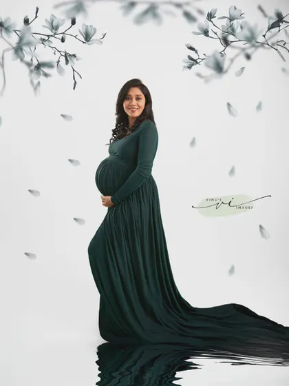 Another variation of the water reflection portrait, this time with a full-length view that emphasizes the graceful train of the green gown.