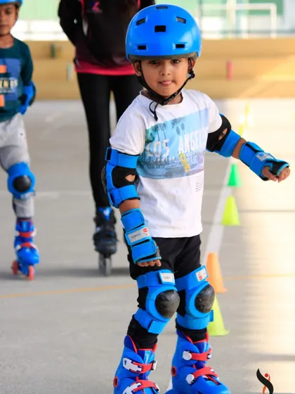 This young skater is learning to glide with confidence. Our coaches are always close by to offer a helping hand and words of encouragement, making the learning process feel safe and fun.