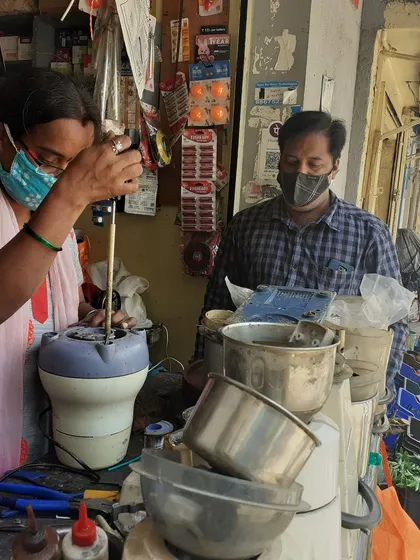 A participant works on a mixer grinder at our Mumbai workshop. We tackle common kitchen appliances that often break down, teaching you how to keep them running.