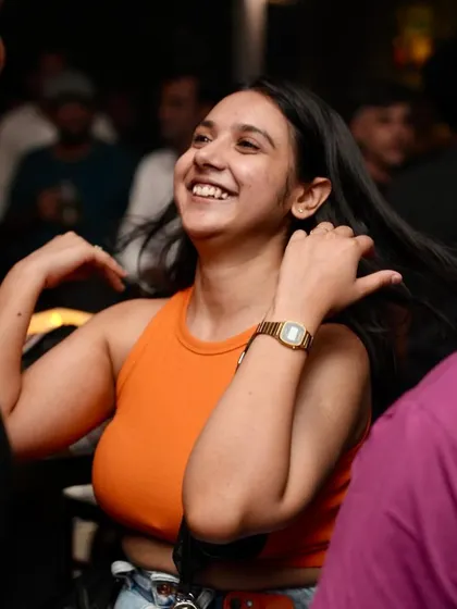 A huge smile from a happy dancer.