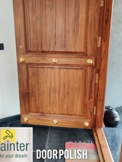 A beautifully finished main door with a natural wood polish. My wood polishing service brings out the grain and character of the wood, providing a premium look and durable protection.