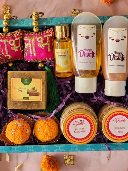 Another angle of my premium Diwali hamper, showcasing the vibrant colors and rich assortment of products. It's a perfect gift for family and friends, combining skincare with festive treats.