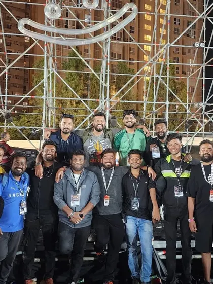 The team behind the magic. A group photo with the Sunburn festival crew in front of the massive stage structure we built together. Collaboration is key to our success.