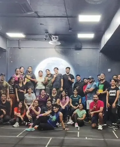 The heart and soul of my classes. Each photo captures a unique moment with my incredible community after a sweaty, joyful session. This is our shared victory lap.