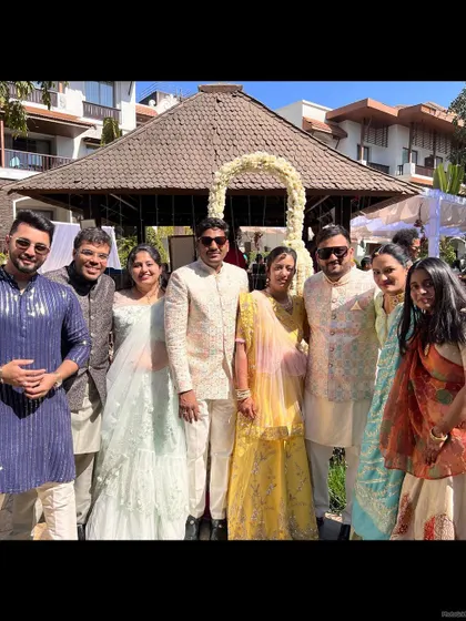 A beautiful family portrait at an outdoor wedding event. It's a joy to see everyone come together and celebrate.