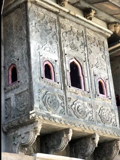 An ornate stone facade of a haveli in Udaipur. The detailed carvings and structural forms are a rich source of inspiration for creating unique and culturally-rooted architectural features.