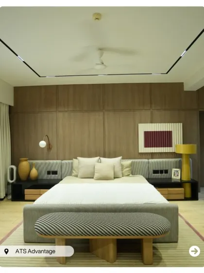 This is what I call a master suite. From the custom wood-paneled feature wall and integrated bedside lighting to the plush, comfortable furnishings, every detail in this penthouse bedroom is crafted for ultimate relaxation and style.
