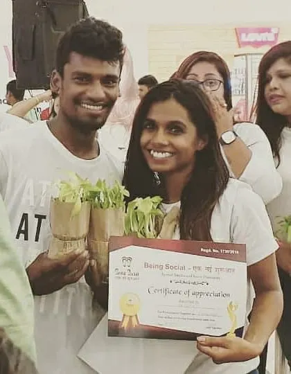 Receiving a certificate of appreciation with my partner Prerna for our work on the 'Being Social' flash mob. It's always rewarding to use dance for a good cause.