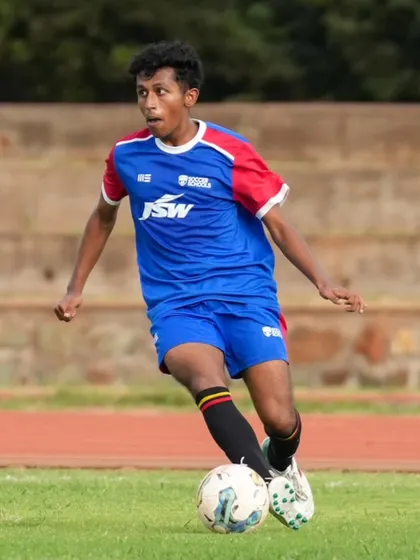 A player on the run during the friendly at the Inspire Institute of Sport. These experiences are vital for growth.