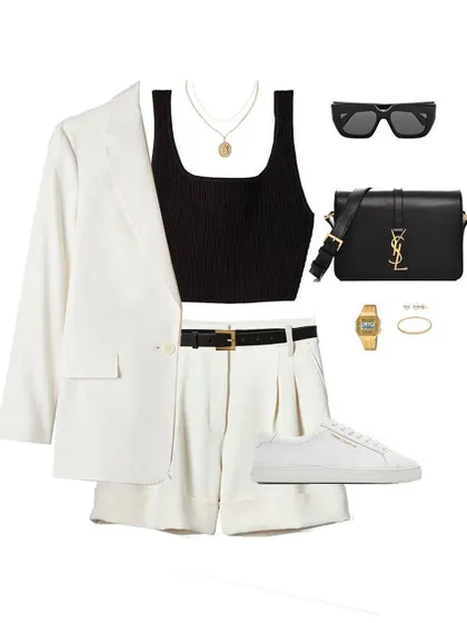 A perfect example of a smart-casual outfit. A white blazer and shorts set is elevated with a simple black top and luxury accessories, but kept relaxed with clean white sneakers.