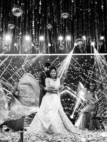 The same grand performance in black and white, highlighting the drama and emotion of the moment.