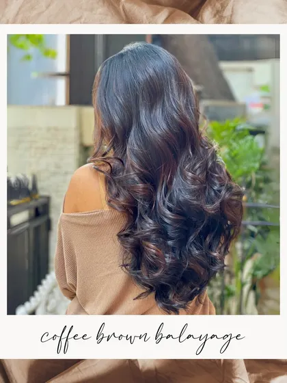 Indulge in a rich Coffee Brown Balayage. This colour is perfect for adding warmth and dimension to dark hair, creating a sophisticated and timeless look.
