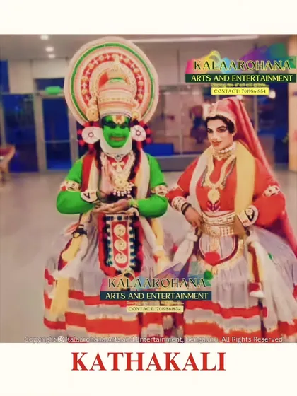 Two of our Kathakali artists posing together. This showcases the different character types we can portray, each with their own unique makeup, costume, and symbolic meaning within the story.