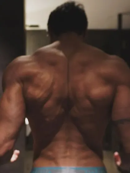 A shot of my back as I walk away, symbolizing the constant forward motion required to stay on top.