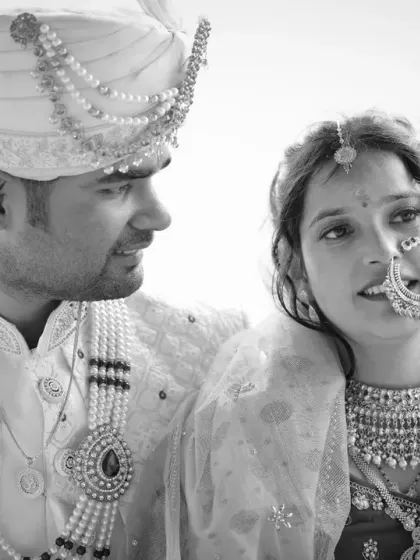 A timeless black and white portrait of the couple from their Triyuginarayan wedding, capturing a raw and intimate moment.