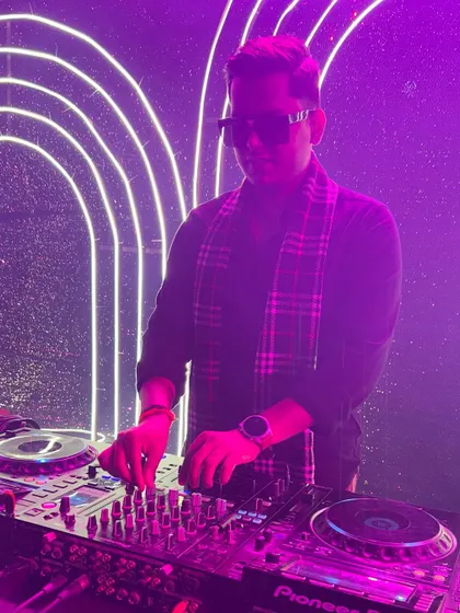 Another look from the same event, with purple lighting creating a cool, modern vibe.