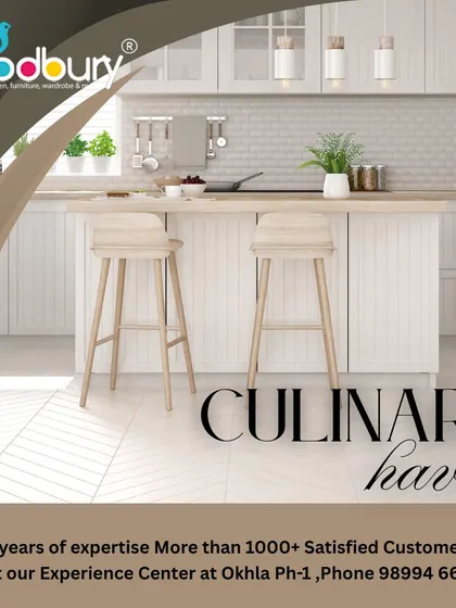 A culinary haven in white and light wood. This bright and airy kitchen concept features a large island with bar stools, creating a welcoming atmosphere.