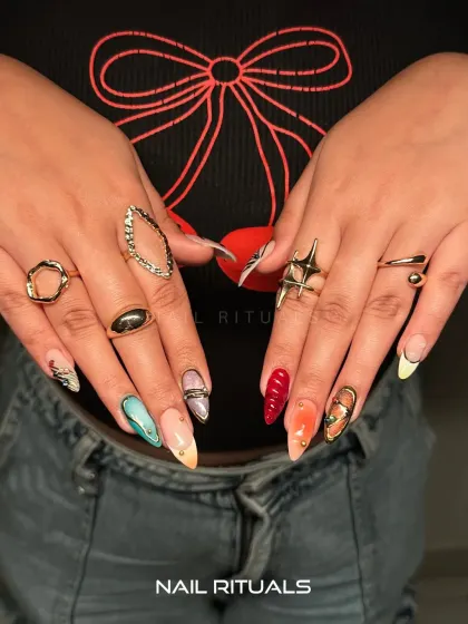 Your vibe, your way. This full view of the abstract set against a simple top shows how your nails can be the main character of your look.