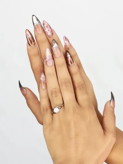 A full view of the mismatched pink marble and chrome set, showing how the different finishes complement each other.
