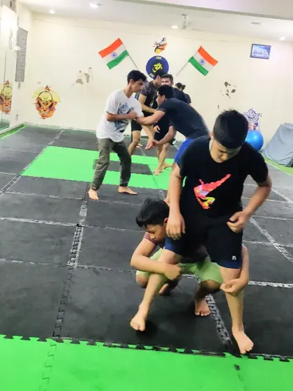 Practice makes you more efficient. Our kids' wrestling class focuses on drilling takedowns and control, building a strong foundation for grappling that will serve them in BJJ and MMA.