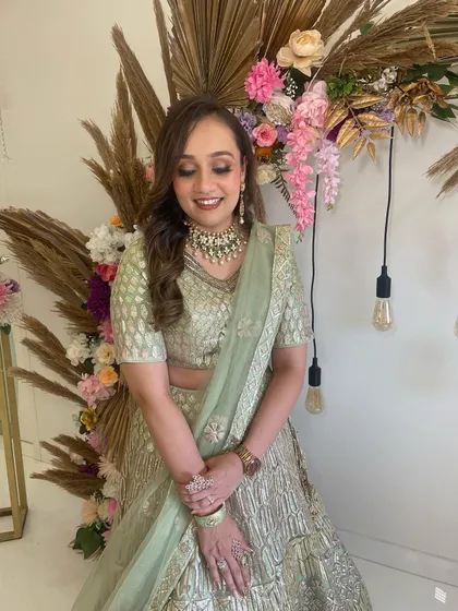 Makeup that looks like your skin. This client is looking like a dream in her pastel green lehenga and soft, natural makeup.