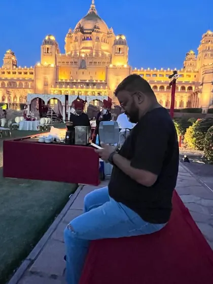 A quiet moment of preparation before the night's festivities at the Jodhpur Palace. Even in the calm, the grandeur is palpable.