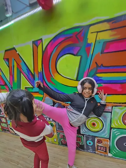This action shot captures the dynamic energy of our kids' classes. We mix technical training with playful exercises to keep them engaged and motivated.