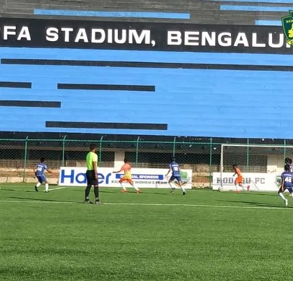 The impressive backdrop of the KSFA stadium during our U-13 league match.