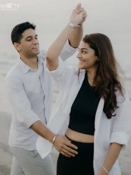 A spontaneous dance on the sand. I love capturing these moments of unscripted joy that truly reflect a couple's playful dynamic.