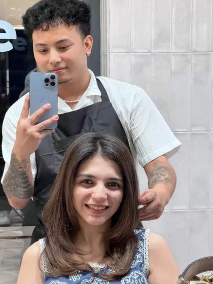 When I make my clients smile, that’s real success. This client is glowing with her new haircut and beautiful, healthy brown hair.