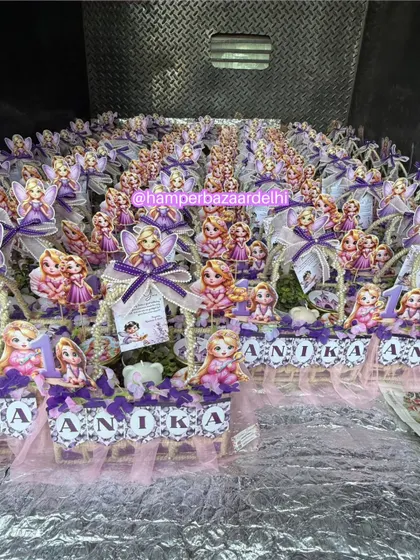 Need to thank a lot of guests? We've got you covered! Here’s a look at a massive order of 150+ Rapunzel-themed hampers for Anika's first birthday, all packed and ready to be delivered. We can handle bulk orders for any theme you can imagine.