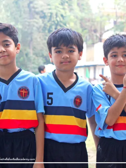Three of our young players posing for the camera. The friendships formed on the pitch are one of the most rewarding parts of being in an academy.
